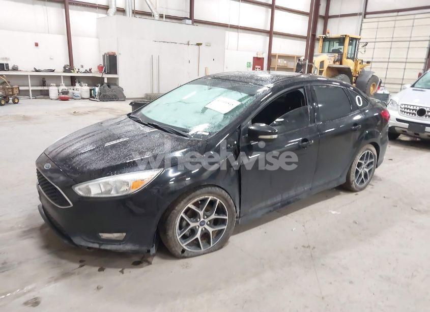 Photo 2 of 2016 Ford Focus SE (VIN 1FADP3F23GL258289)