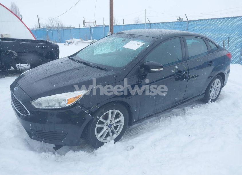 Photo 2 of 2016 Ford Focus SE (VIN 1FADP3F23GL312223)