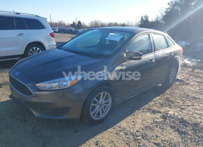 Photo 2 of 2016 Ford Focus SE (VIN 1FADP3F23GL357131)