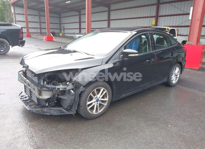 Photo 2 of 2017 Ford Focus SE (VIN 1FADP3F23HL293741)