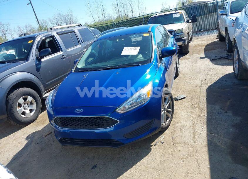 Photo 12 of 2018 Ford Focus SE (VIN 1FADP3F23JL324380)