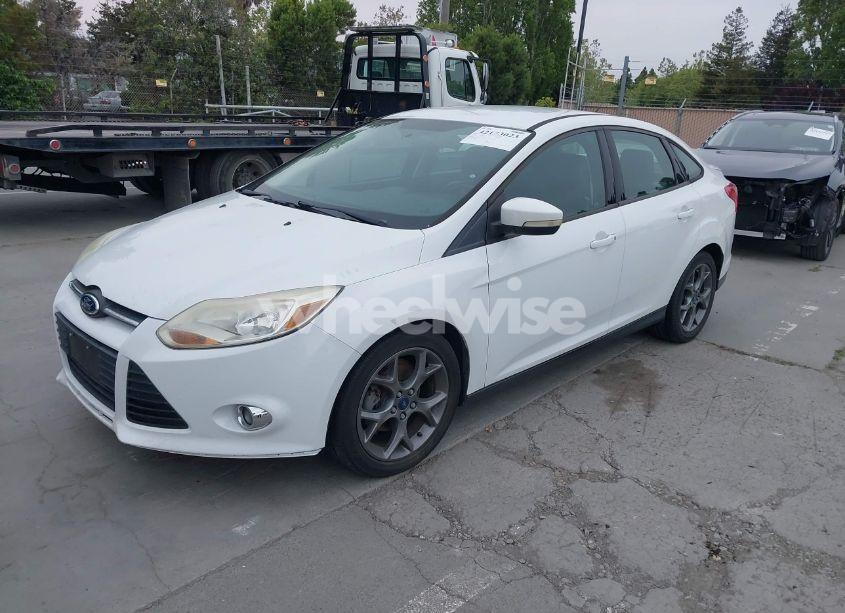 Photo 2 of 2013 Ford Focus SE (VIN 1FADP3F24DL152798)