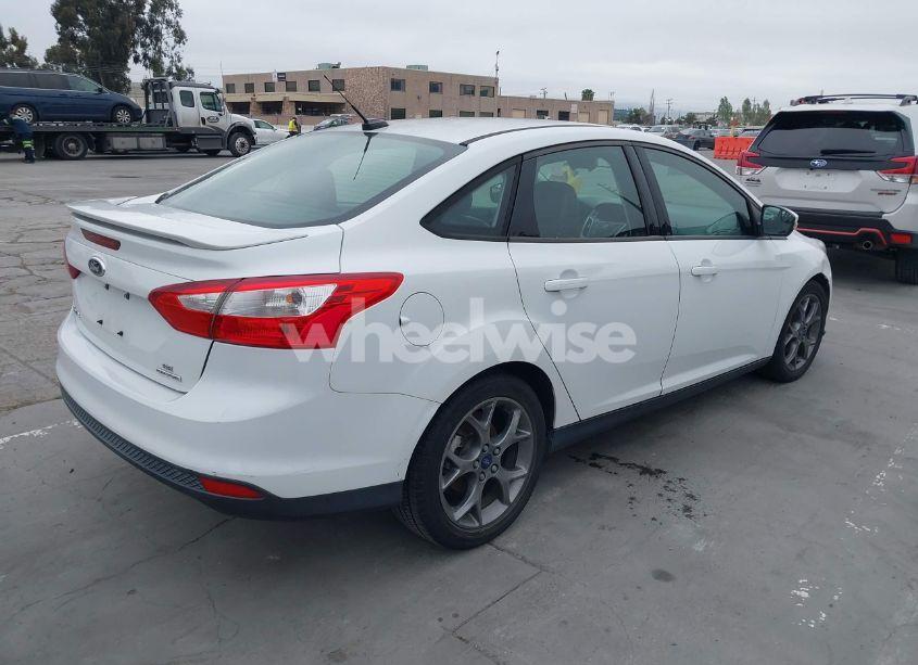 Photo 4 of 2013 Ford Focus SE (VIN 1FADP3F24DL152798)