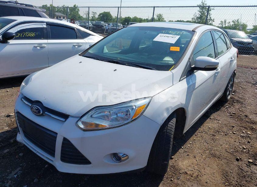 Photo 2 of 2013 Ford Focus SE (VIN 1FADP3F24DL188104)