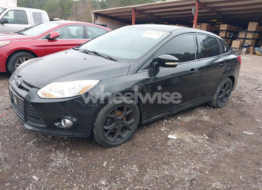 Photo 2 of 2013 Ford Focus SE (VIN 1FADP3F24DL212319)