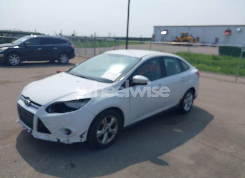 Photo 2 of 2013 Ford Focus SE (VIN 1FADP3F24DL241965)