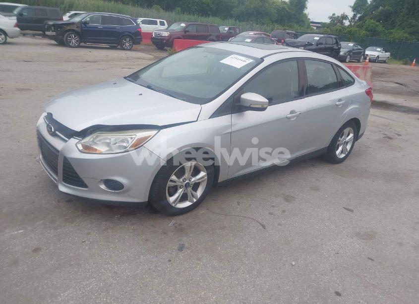 Photo 2 of 2013 Ford Focus SE (VIN 1FADP3F24DL323386)