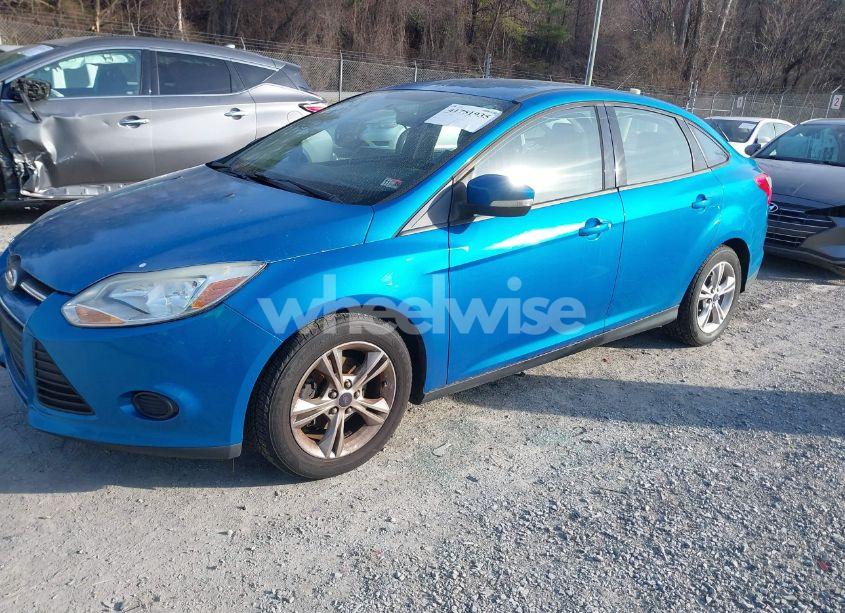 Photo 2 of 2013 Ford Focus SE (VIN 1FADP3F24DL335747)