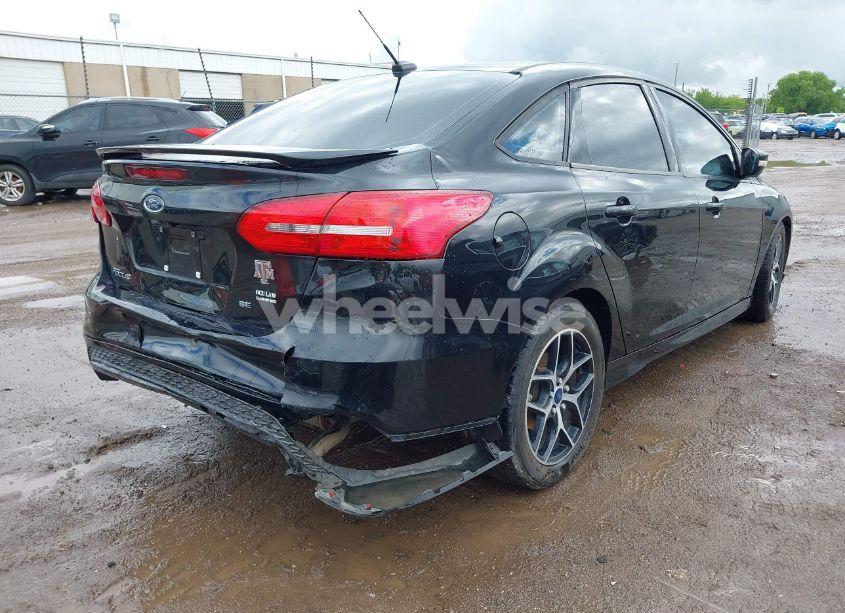 Photo 4 of 2015 Ford Focus SE (VIN 1FADP3F24FL349439)