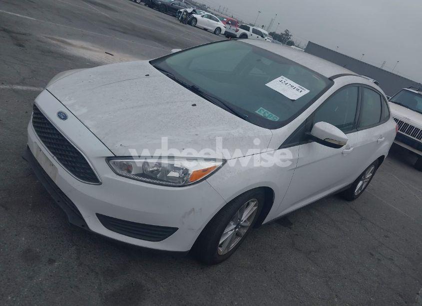 Photo 2 of 2016 Ford Focus SE (VIN 1FADP3F24GL255000)