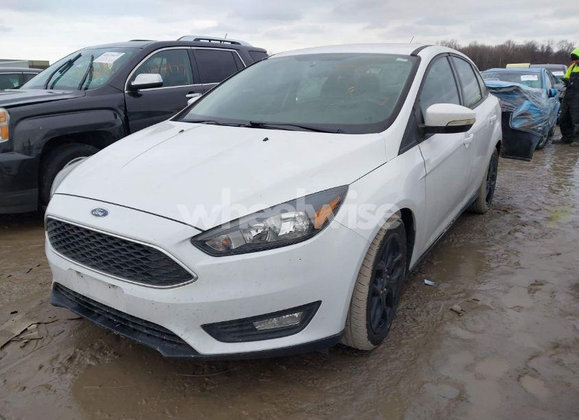 Photo 2 of 2016 Ford Focus SE (VIN 1FADP3F24GL397864)