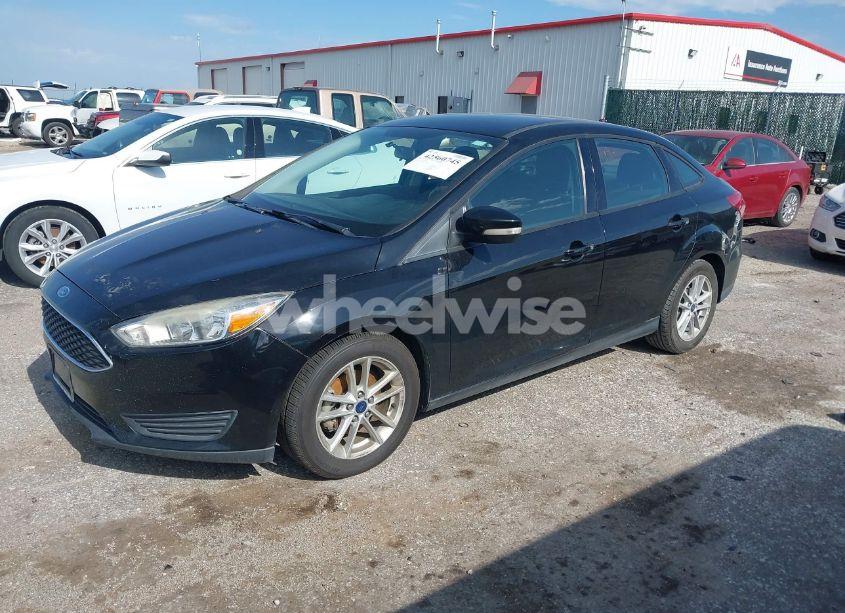 Photo 2 of 2017 Ford Focus SE (VIN 1FADP3F24HL217719)