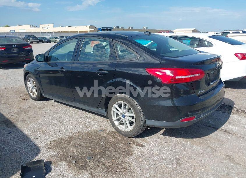 Photo 3 of 2017 Ford Focus SE (VIN 1FADP3F24HL217719)