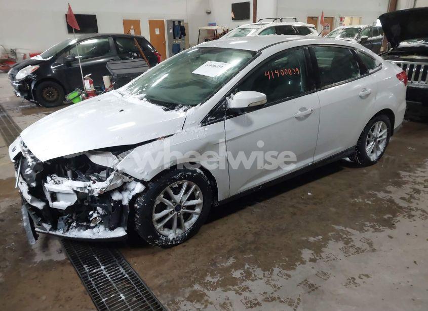 Photo 2 of 2017 Ford Focus SE (VIN 1FADP3F24HL219177)