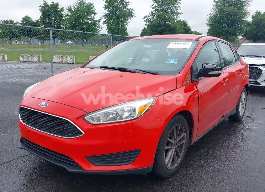 Photo 2 of 2017 Ford Focus SE (VIN 1FADP3F24HL231118)