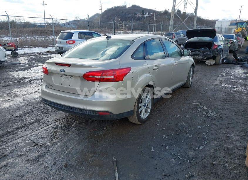 Photo 4 of 2017 Ford Focus SE (VIN 1FADP3F24HL340615)