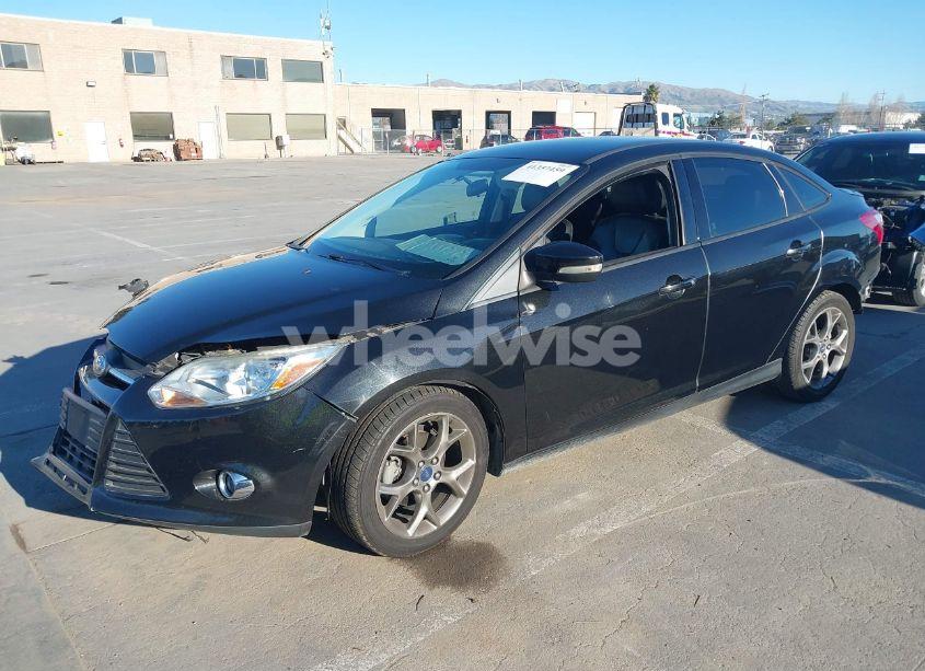 Photo 2 of 2013 Ford Focus SE (VIN 1FADP3F25DL277714)
