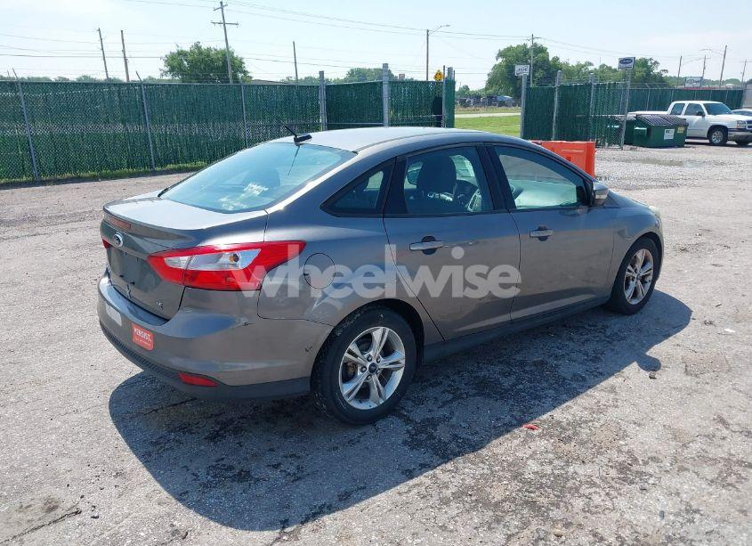 Photo 4 of 2013 Ford Focus SE (VIN 1FADP3F25DL337961)