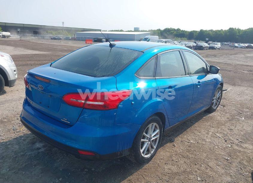 Photo 4 of 2015 Ford Focus SE (VIN 1FADP3F25FL230220)