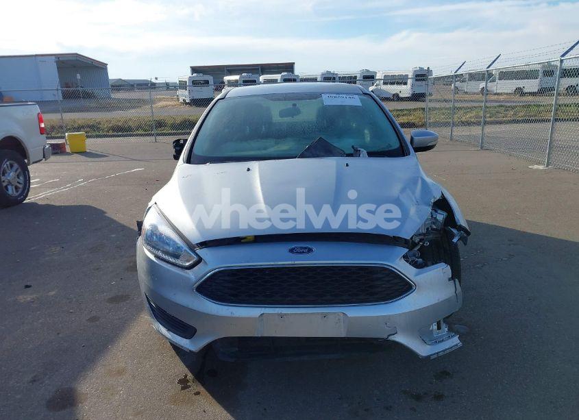 Photo 12 of 2017 Ford Focus SE (VIN 1FADP3F25HL223058)