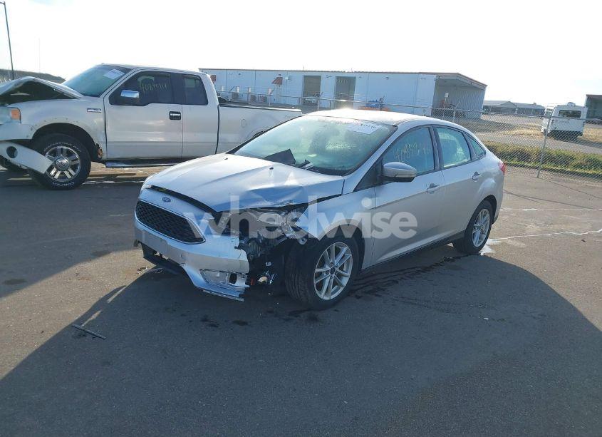 Photo 2 of 2017 Ford Focus SE (VIN 1FADP3F25HL223058)
