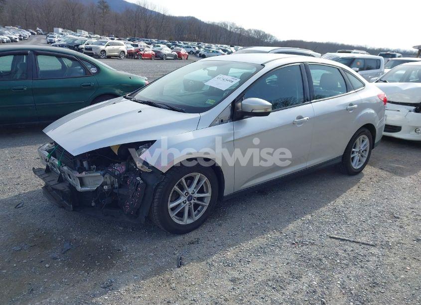 Photo 2 of 2017 Ford Focus SE (VIN 1FADP3F25HL281414)