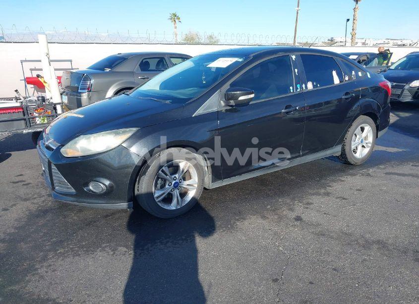 Photo 2 of 2013 Ford Focus SE (VIN 1FADP3F26DL210944)