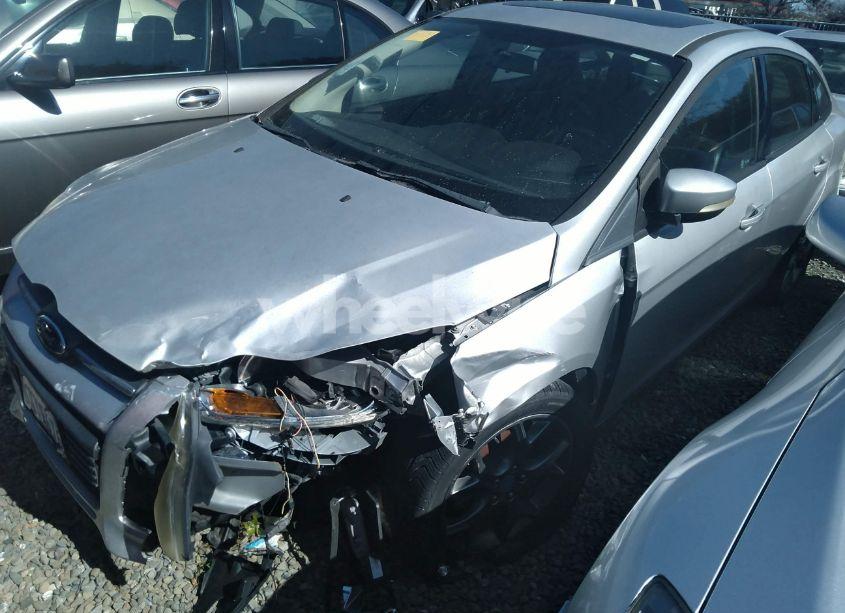 Photo 2 of 2013 Ford Focus SE (VIN 1FADP3F26DL235990)