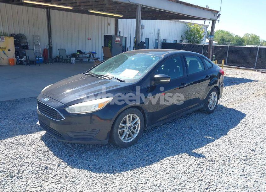 Photo 2 of 2016 Ford Focus SE (VIN 1FADP3F26GL285390)