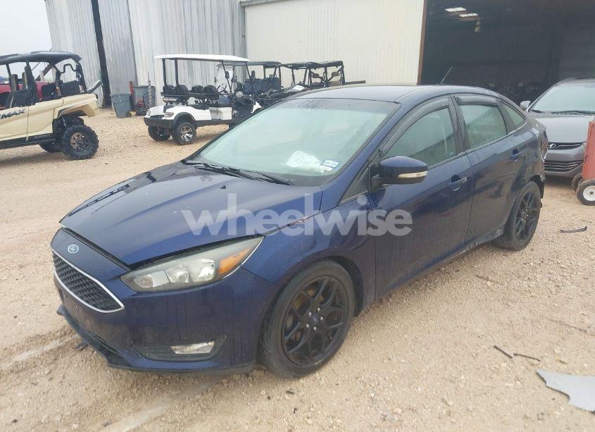 Photo 2 of 2016 Ford Focus SE (VIN 1FADP3F26GL295160)