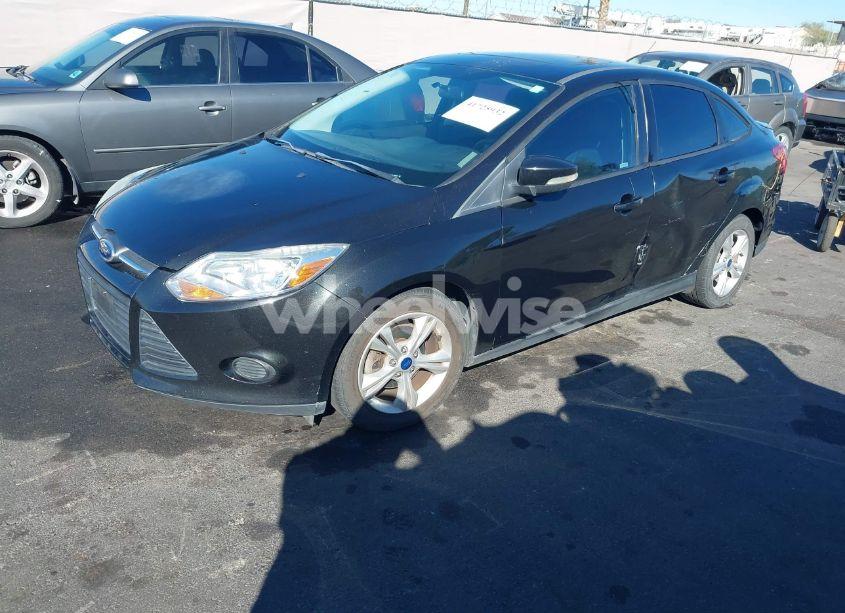 Photo 2 of 2013 Ford Focus SE (VIN 1FADP3F27DL107404)