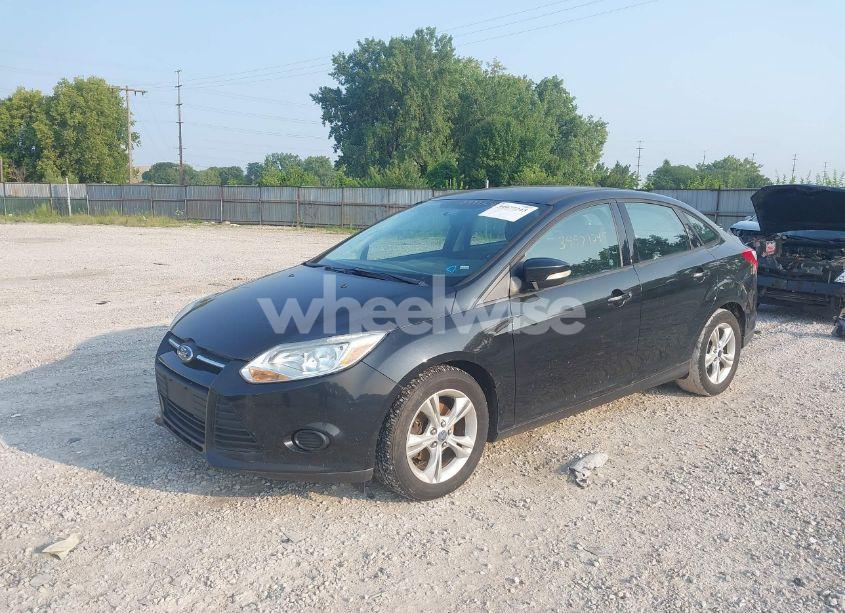 Photo 2 of 2013 Ford Focus SE (VIN 1FADP3F27DL176013)