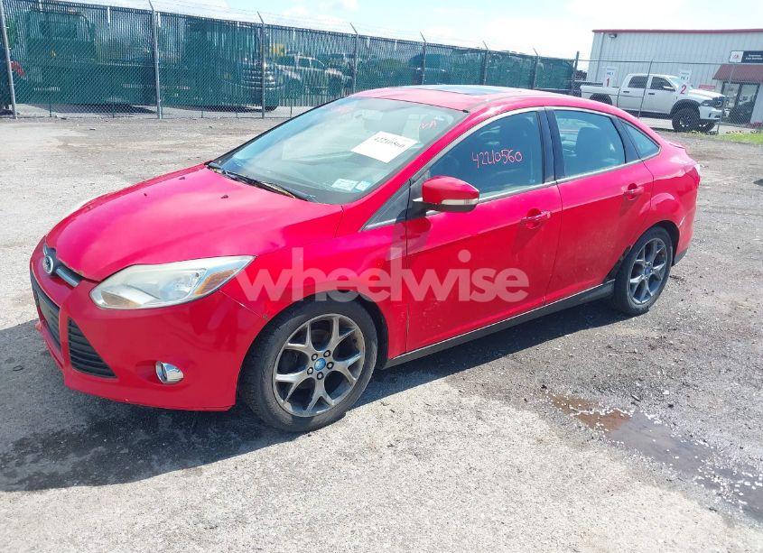 Photo 2 of 2013 Ford Focus SE (VIN 1FADP3F27DL227588)