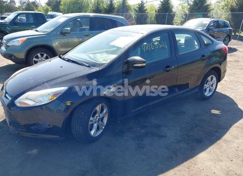 Photo 2 of 2013 Ford Focus SE (VIN 1FADP3F27DL330672)