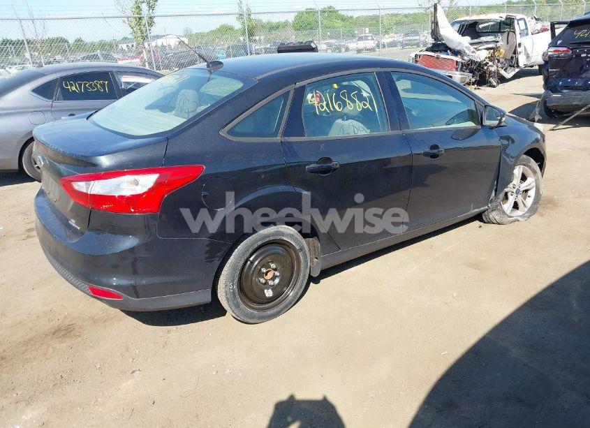 Photo 4 of 2013 Ford Focus SE (VIN 1FADP3F27DL330672)