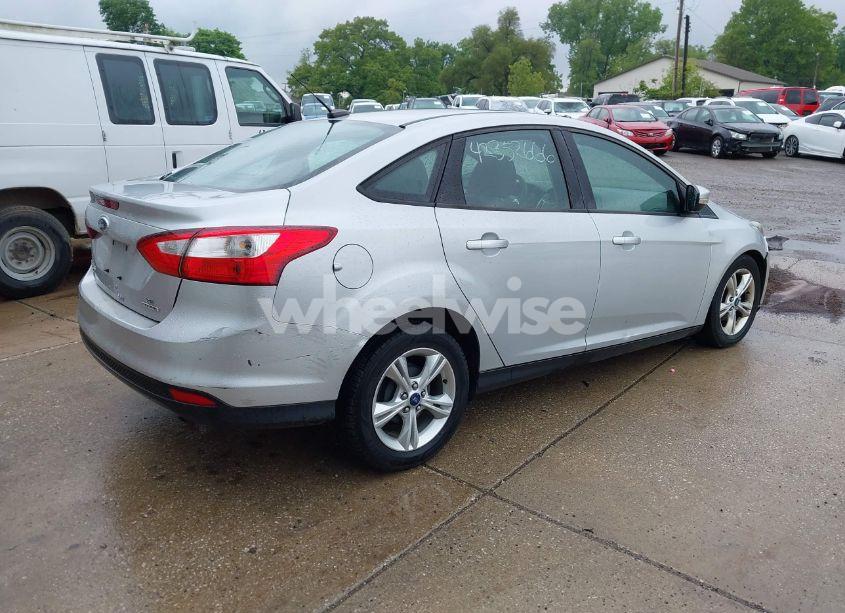 Photo 4 of 2013 Ford Focus SE (VIN 1FADP3F27DL332048)