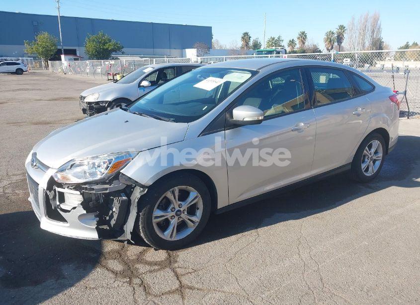 Photo 2 of 2013 Ford Focus SE (VIN 1FADP3F27DL354101)