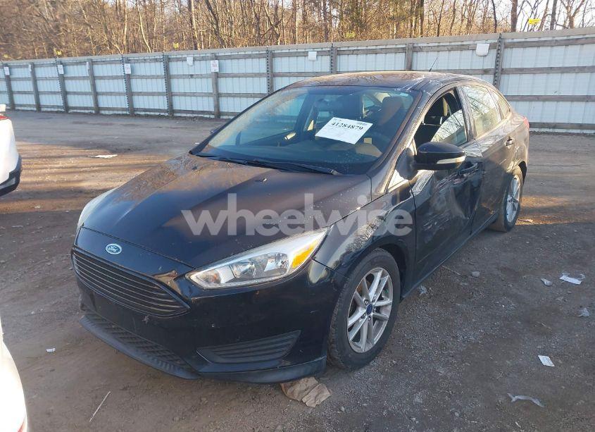 Photo 2 of 2016 Ford Focus SE (VIN 1FADP3F27GL251037)