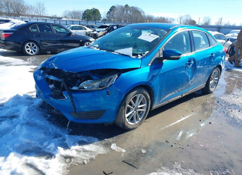 Photo 2 of 2016 Ford Focus SE (VIN 1FADP3F27GL297273)