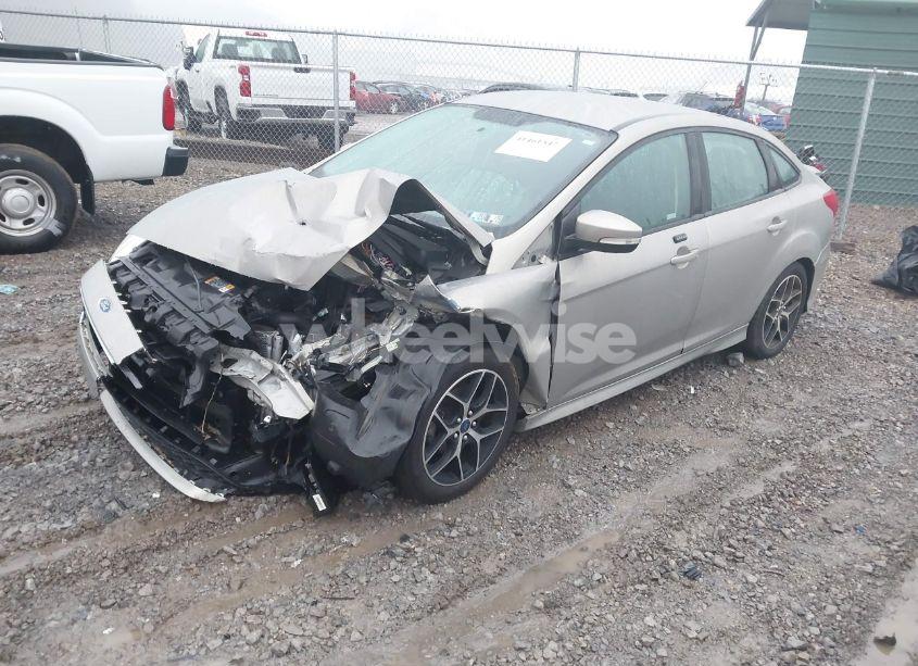 Photo 2 of 2016 Ford Focus SE (VIN 1FADP3F27GL358458)