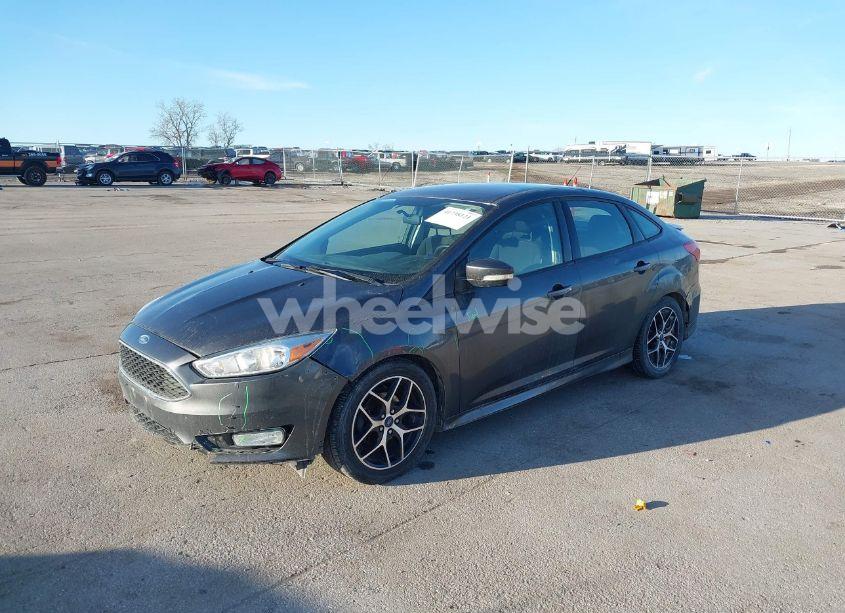 Photo 2 of 2016 Ford Focus SE (VIN 1FADP3F27GL374188)