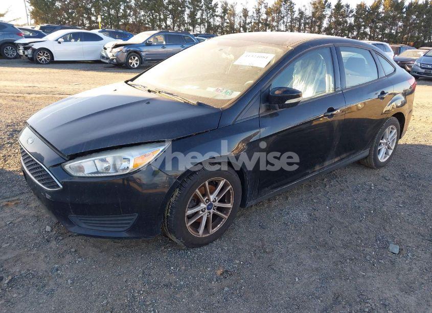 Photo 2 of 2016 Ford Focus SE (VIN 1FADP3F27GL385112)