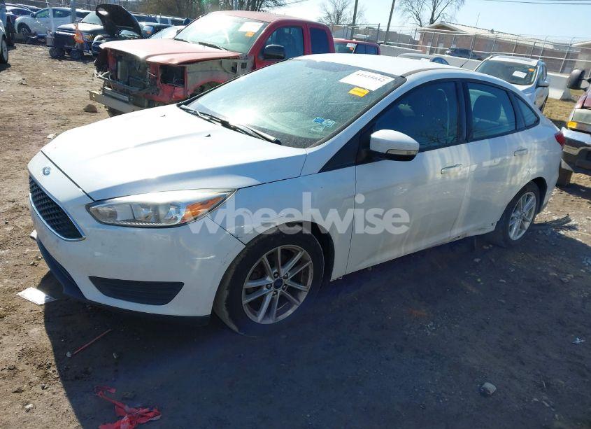 Photo 2 of 2017 Ford Focus SE (VIN 1FADP3F27HL321590)
