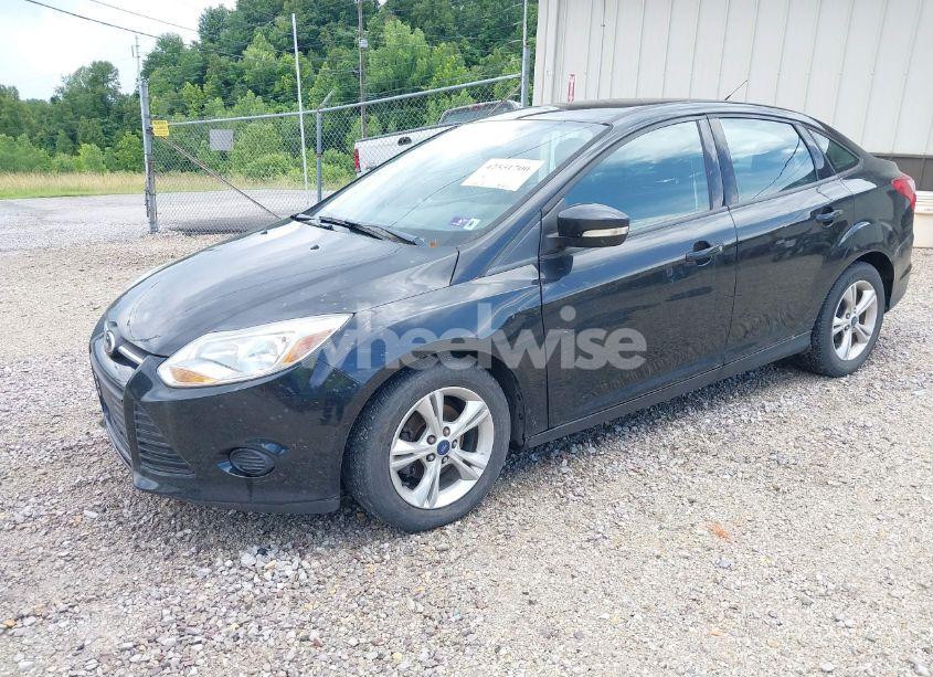 Photo 2 of 2013 Ford Focus SE (VIN 1FADP3F28DL232167)