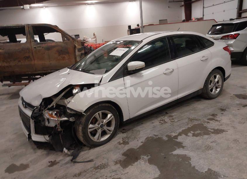 Photo 2 of 2013 Ford Focus SE (VIN 1FADP3F28DL332477)