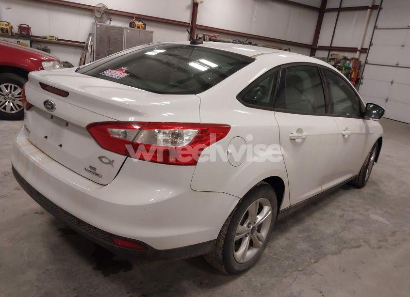 Photo 4 of 2013 Ford Focus SE (VIN 1FADP3F28DL332477)