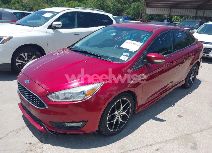 Photo 2 of 2016 Ford Focus SE (VIN 1FADP3F28GL237888)