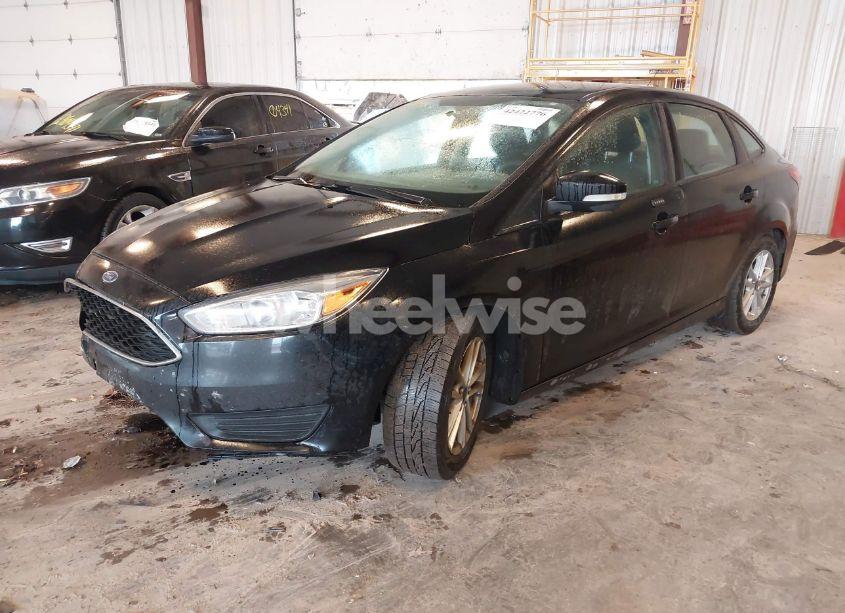 Photo 2 of 2016 Ford Focus SE (VIN 1FADP3F28GL251371)