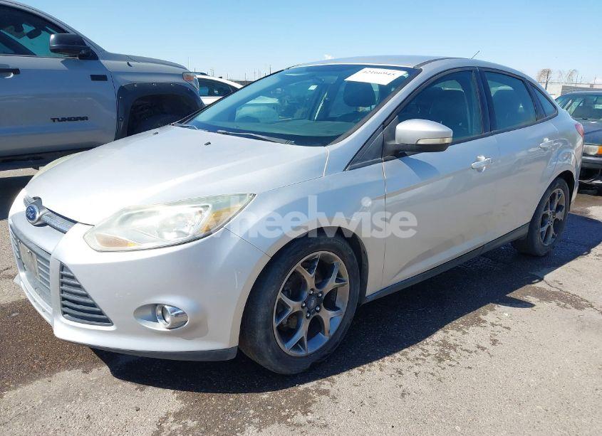 Photo 2 of 2013 Ford Focus SE (VIN 1FADP3F29DL158743)