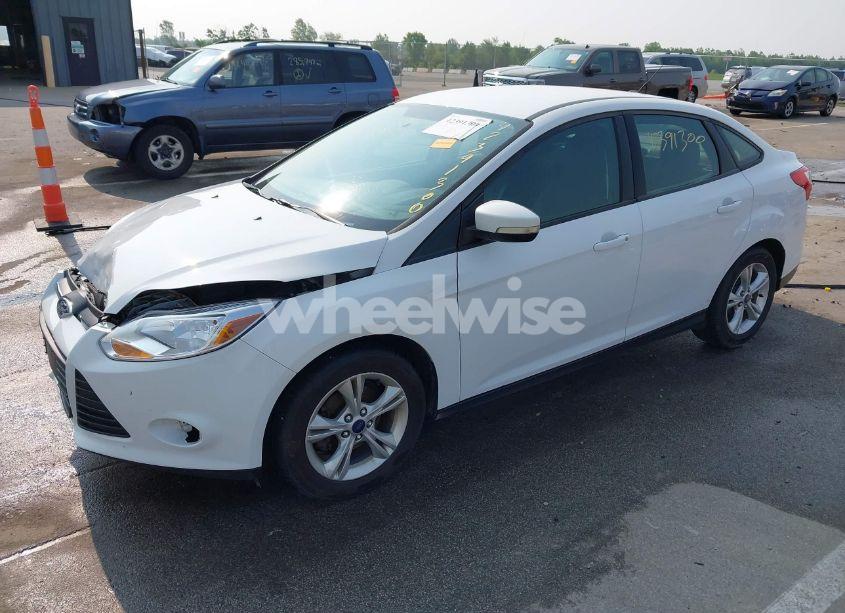 Photo 2 of 2013 Ford Focus SE (VIN 1FADP3F29DL309581)